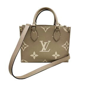 Louis Vuitton Handbag Bicolor Empreinte On the Go Tourtreme Crme